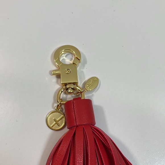 Red and gold tone metal tassel key ring holder with USB cord cable - Picture 2 of 4